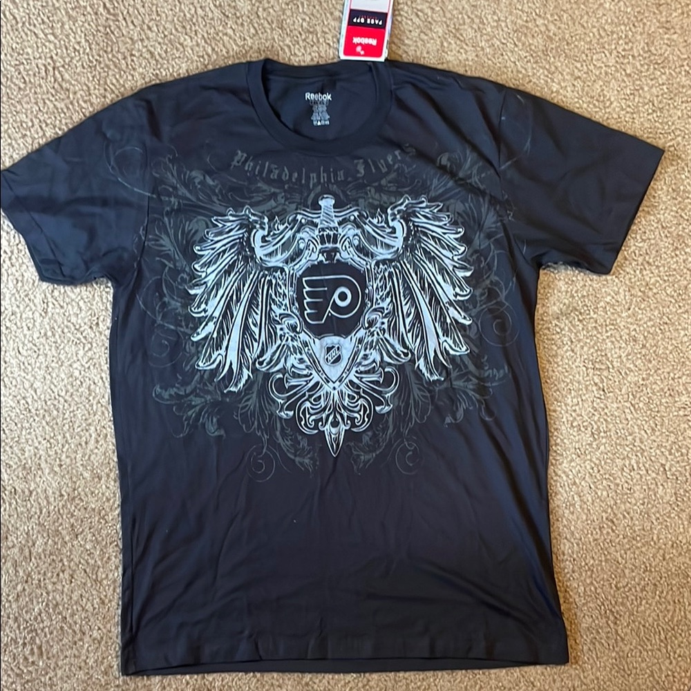 Reebok Black Short Sleeve Tee with Ornate Crest Design